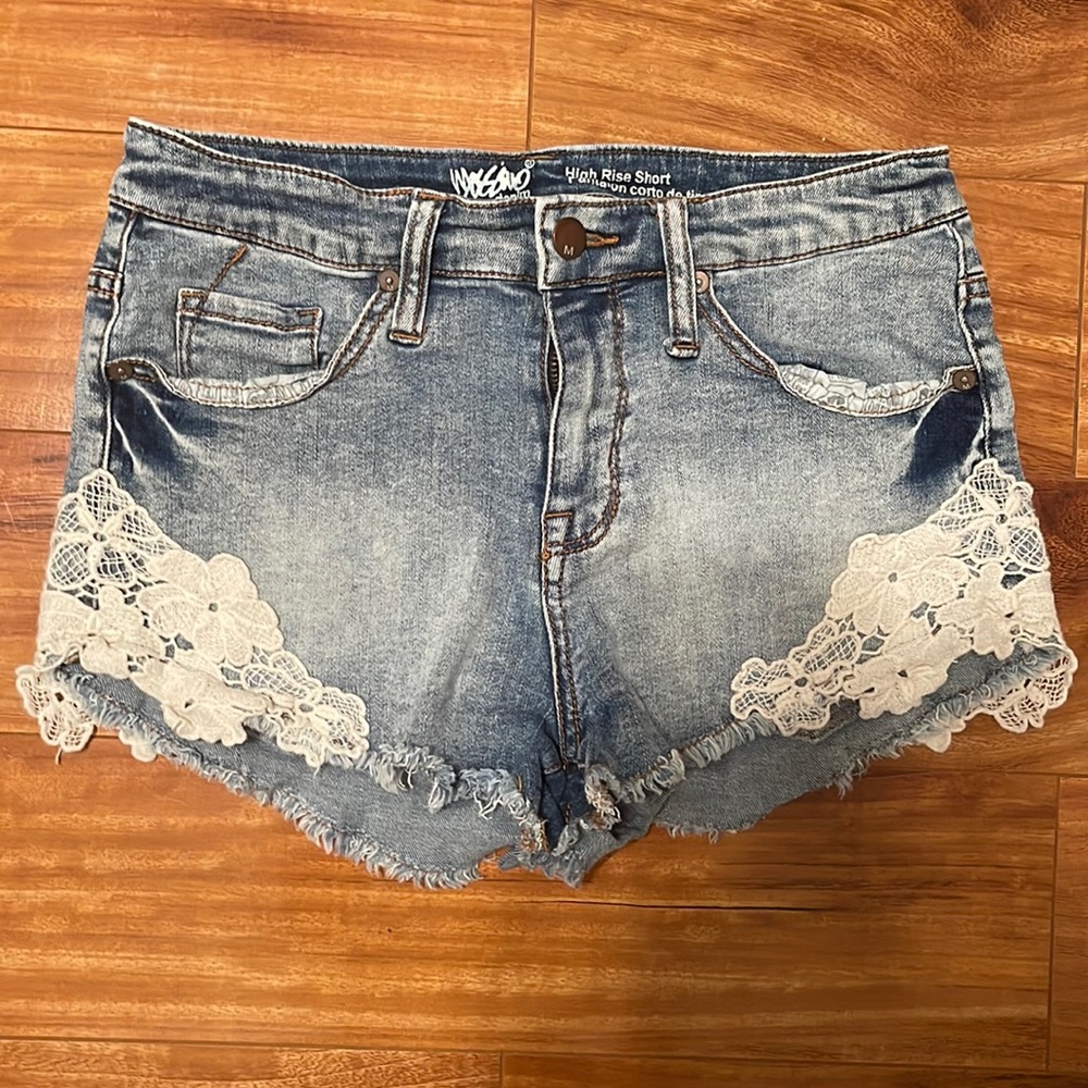 High rise jean shorts with flower detail